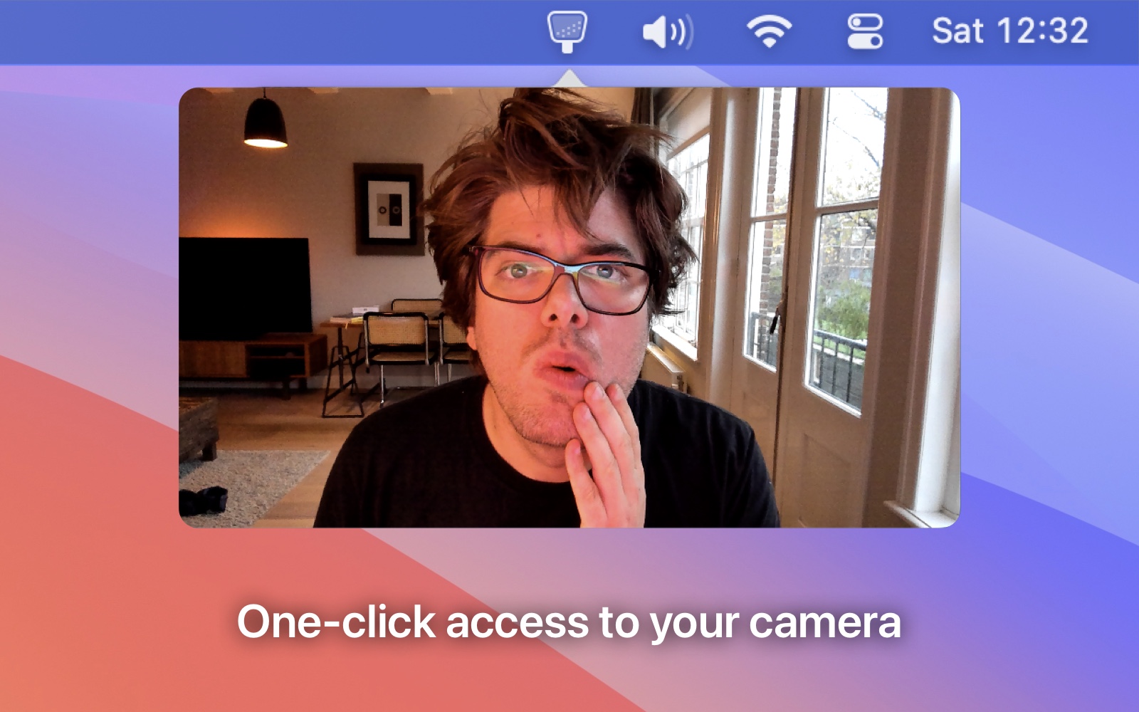 Screenshot of the menu bar with Hand Mirror open, showing a camera view of the developer's face looking kinda stupid if I'm honest.