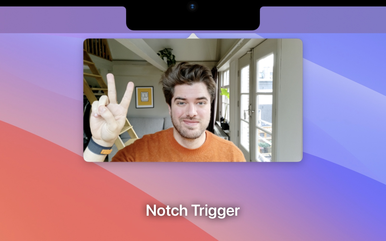 Screenshot of the camera being trigger from under a Mac notch.